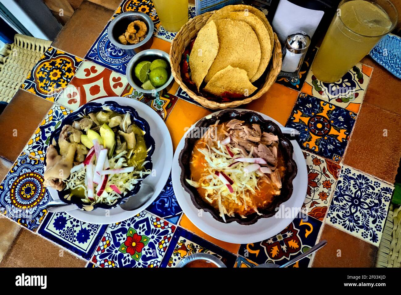 Spicy red and green pozole, a speciality in Guadalajara, Jalisco, Mexico Stock Photo