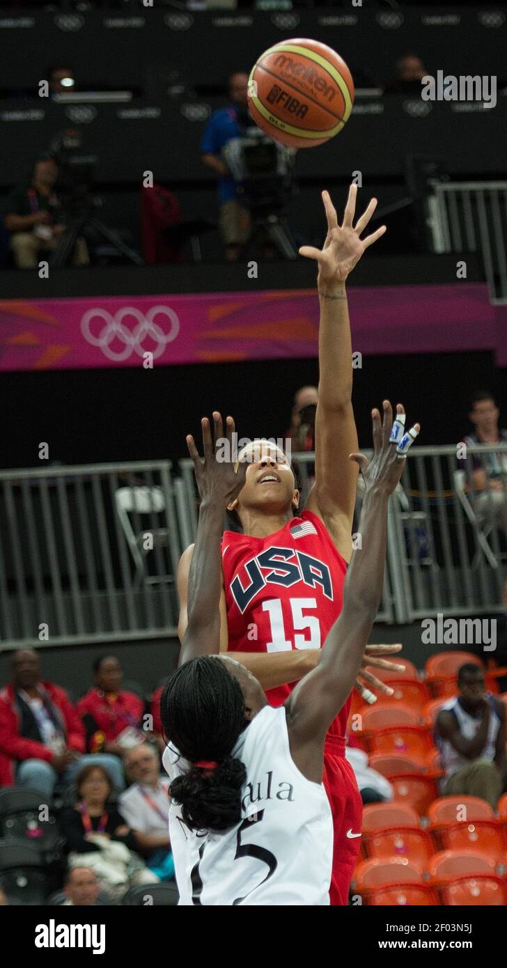 USA's Candace Parker (15) shoots over Angola's Ngiendula Filipe (15