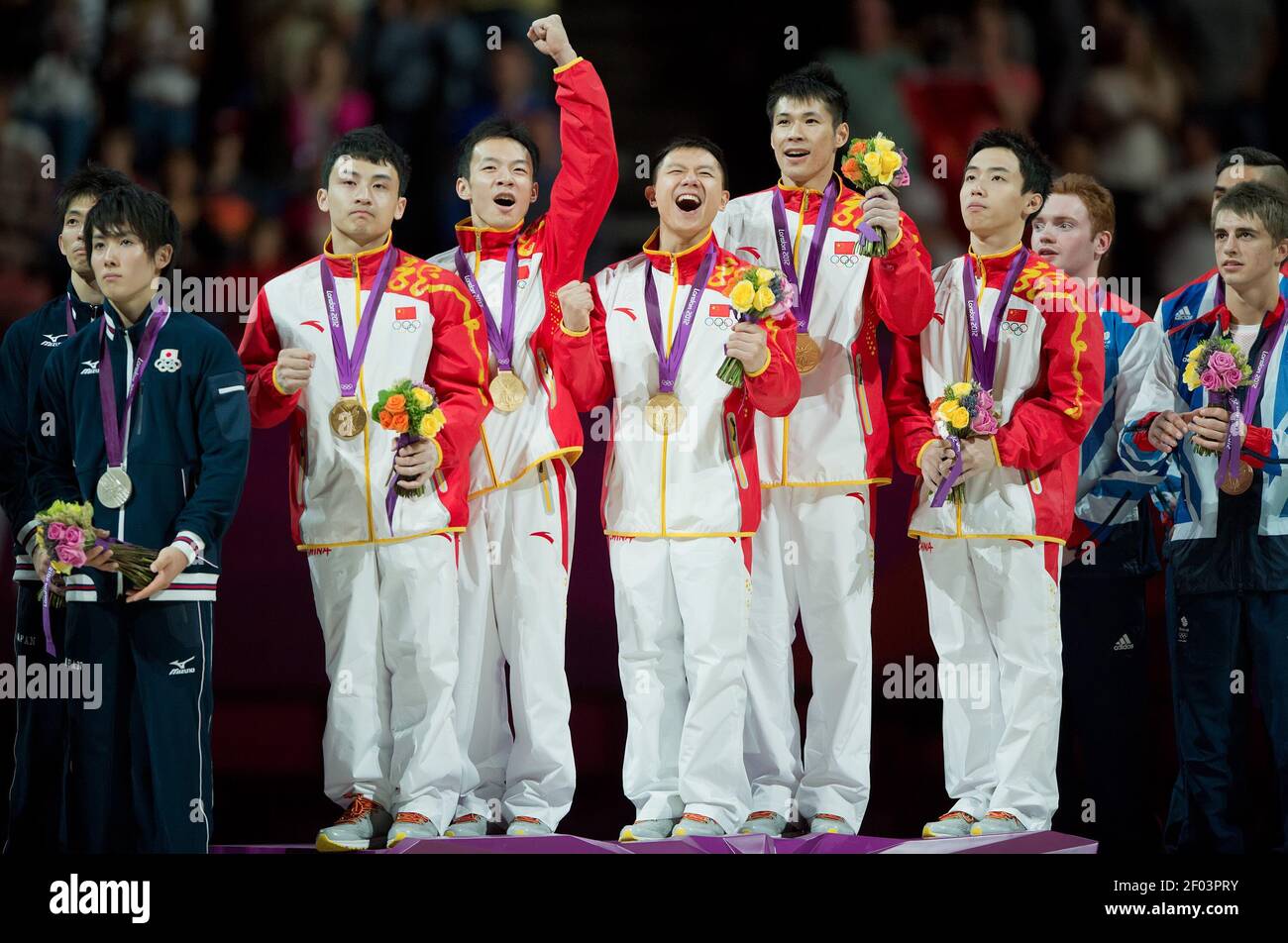 The Men S Gymnastics Team From China Celebrated Their Gold Medal On During Victory Ceremonies At North Greenwich Arena During The 12 Summer Olympic Games In London England Monday July 30 12 Photo The Men S Gymnastics Team From China Celebrated Their Gold Medal On During Victory Ceremonies At North Greenwich Arena During The 12 Summer Olympic Games In London England Monday July 30 12 Photo