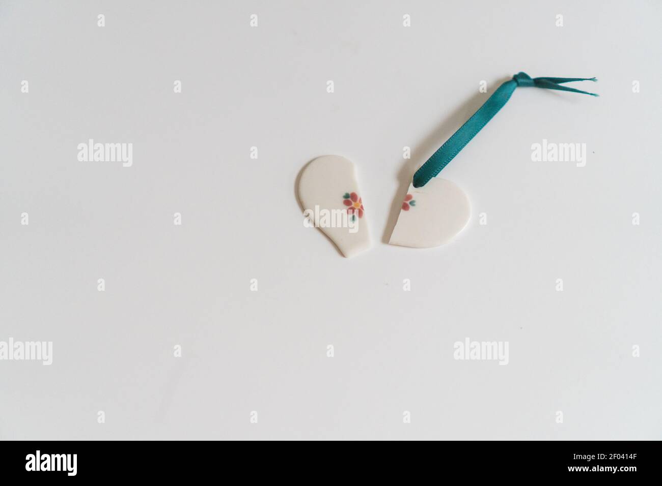 state of mind: a broken heart on white background Stock Photo