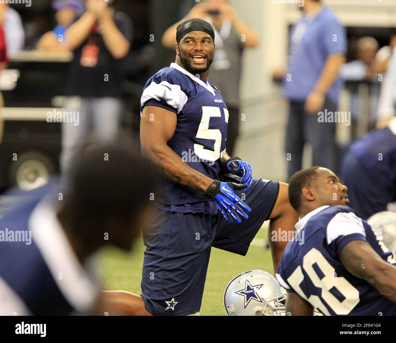 Dallas Cowboys linebacker Victor Butler (57) looks into the stands