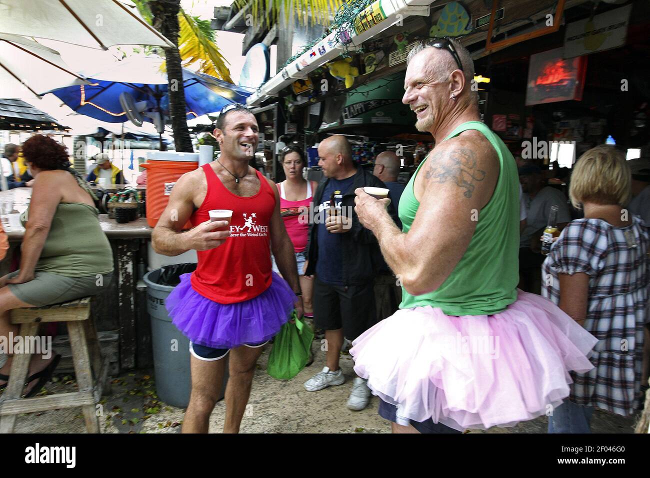 Kirk Zimmerman, left, and Kevin Rew of Key West, Florida party through ...