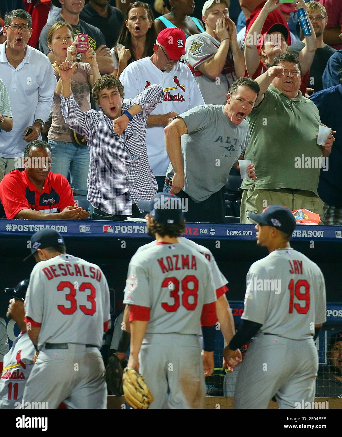 Atlanta Braves fan jeer at St. Louis Cardinals players leaving the field in  the eighth inning, after umpires called an infield fly rule on the Braves' Andrelton  Simmons, which resulted in the, image size:1088x1390