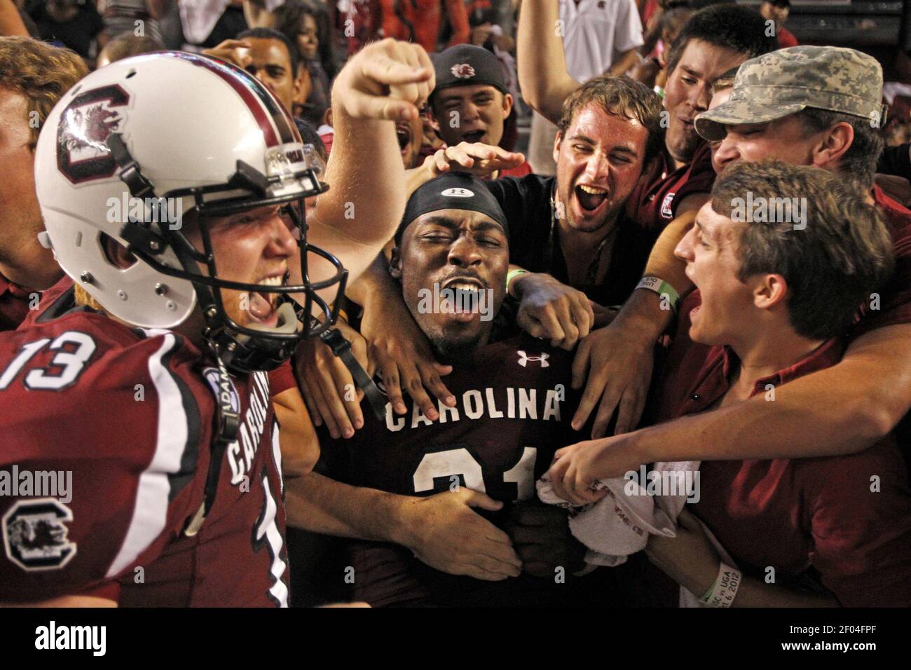 South Carolina running back Marcus Lattimore (21) celebrates with fans