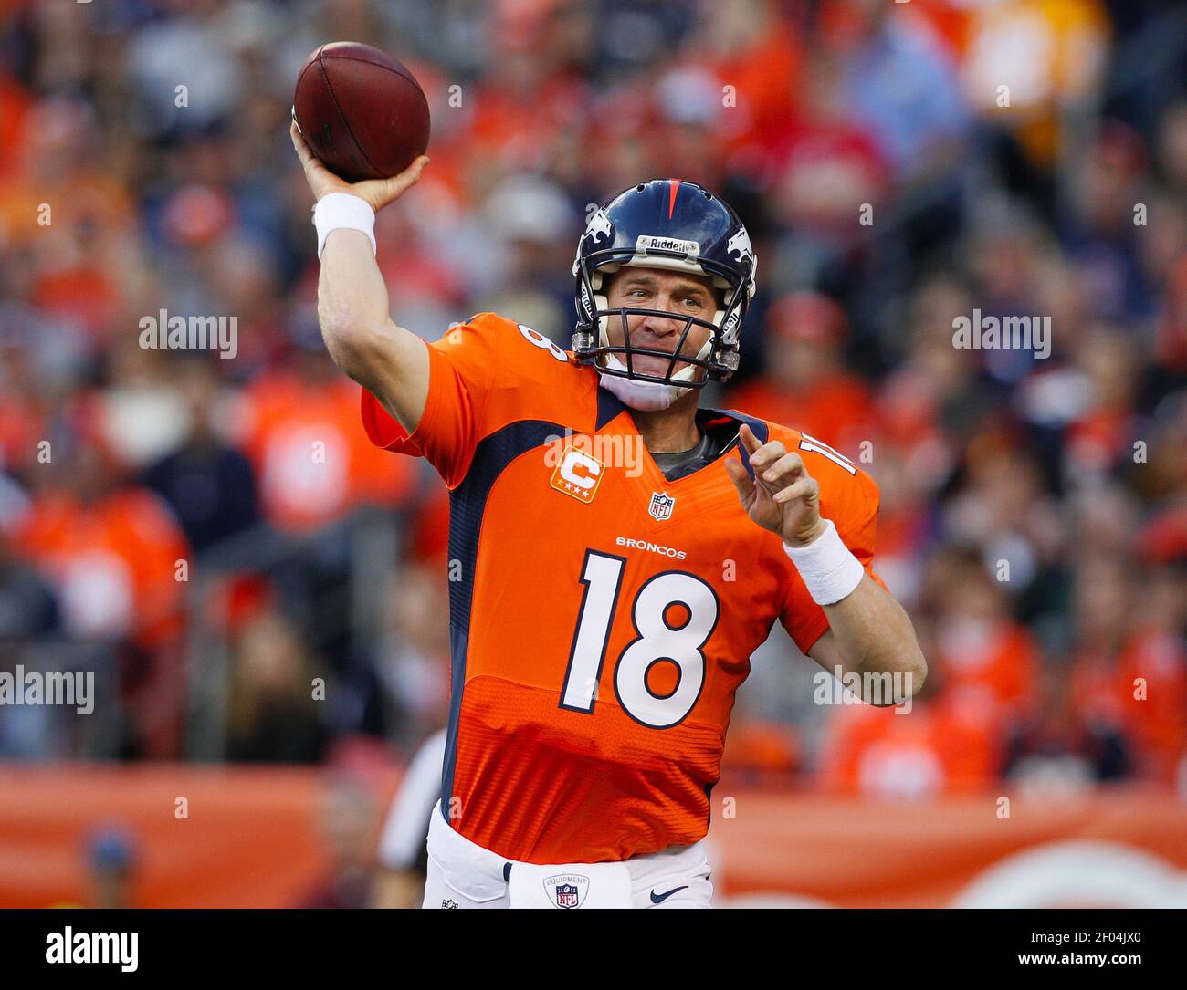 Denver Broncos quarterback Peyton Manning (18) completes a pass to ...