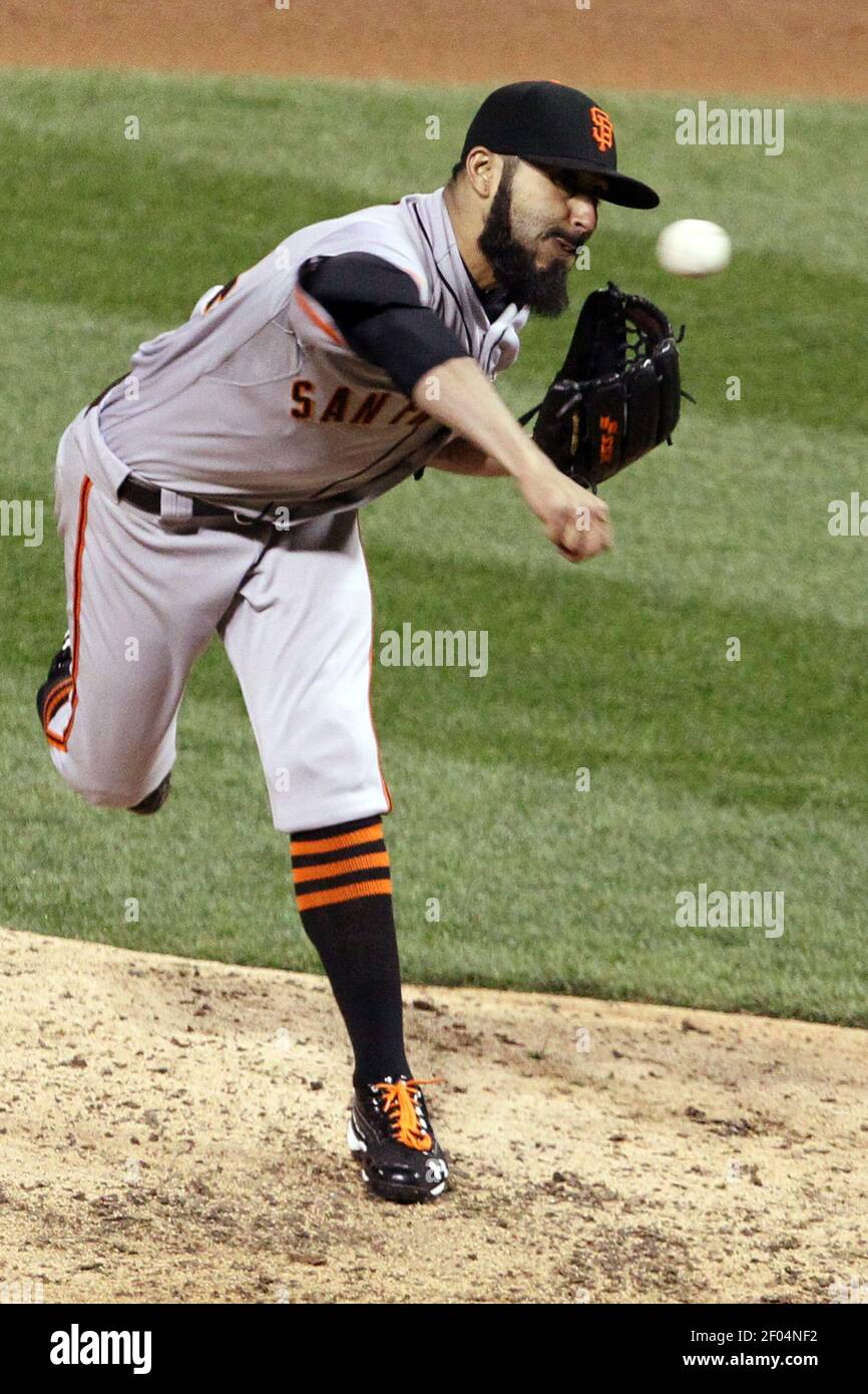 San Francisco pitcher Sergio Romo throws in ninth inning against the St ...