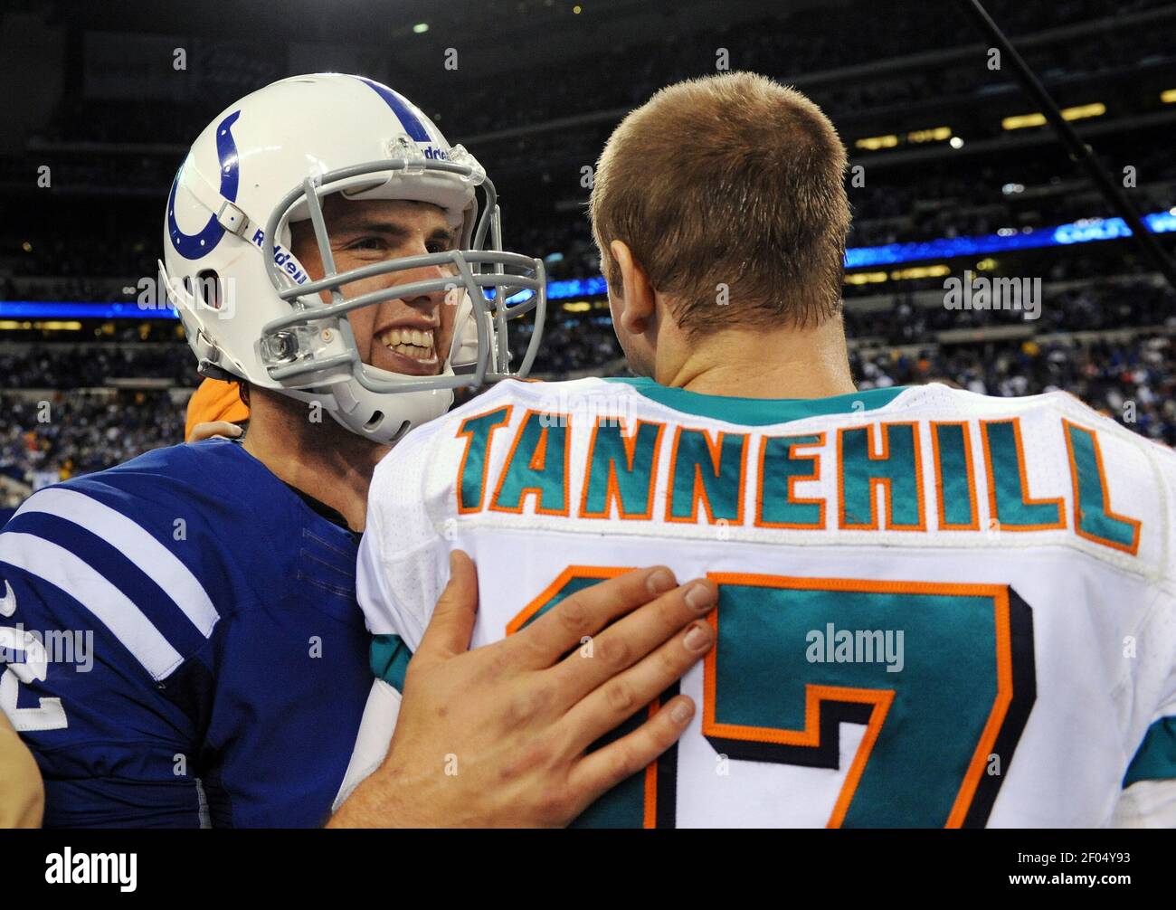 Andrew Luck of the Indianapolis Colts greets Ryan Tannehill of the Miami Dolphins after their