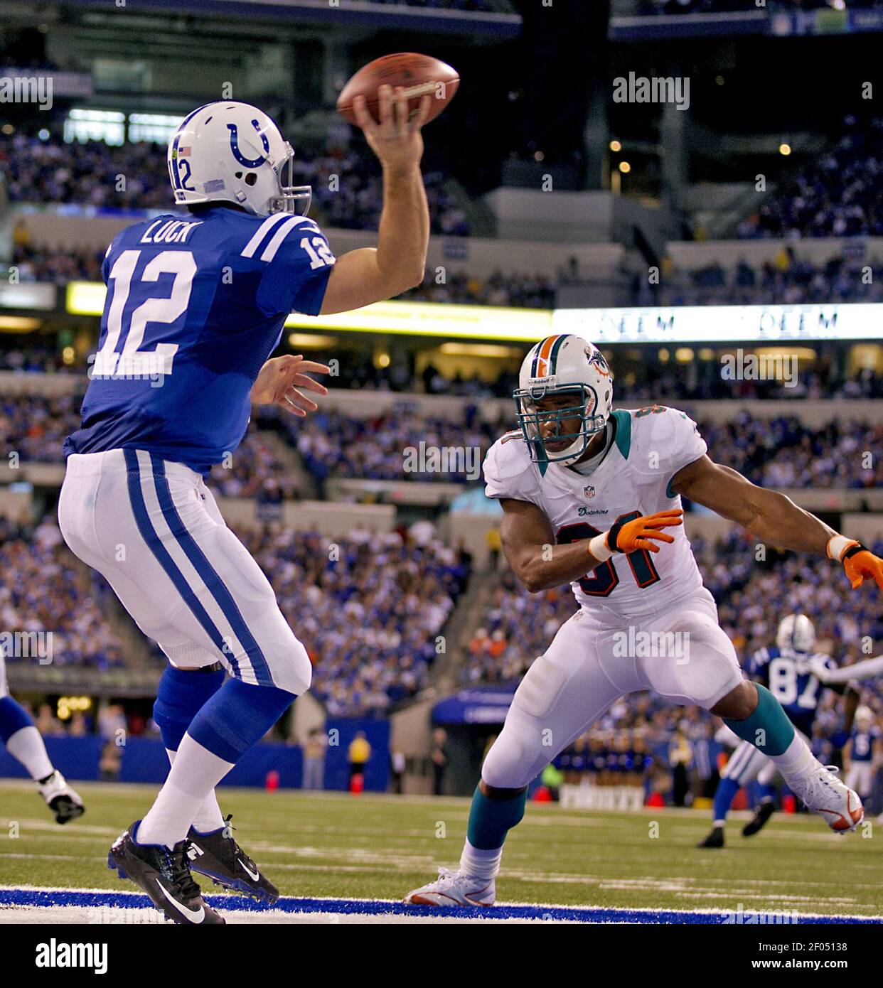 Colts Quarterback Andrew Luck throws out of the end zone over Miami