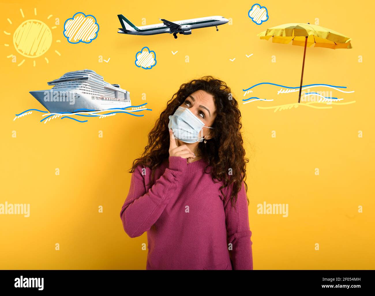 Woman want to travel but is worried about codiv-19 pandemic. yellow background Stock Photo