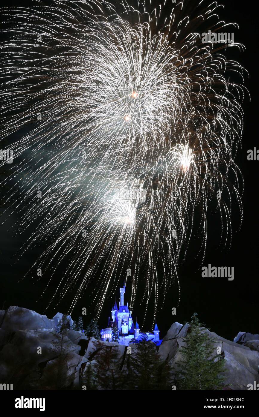 Fireworks blast over the Beast's Castle during a preview party at the