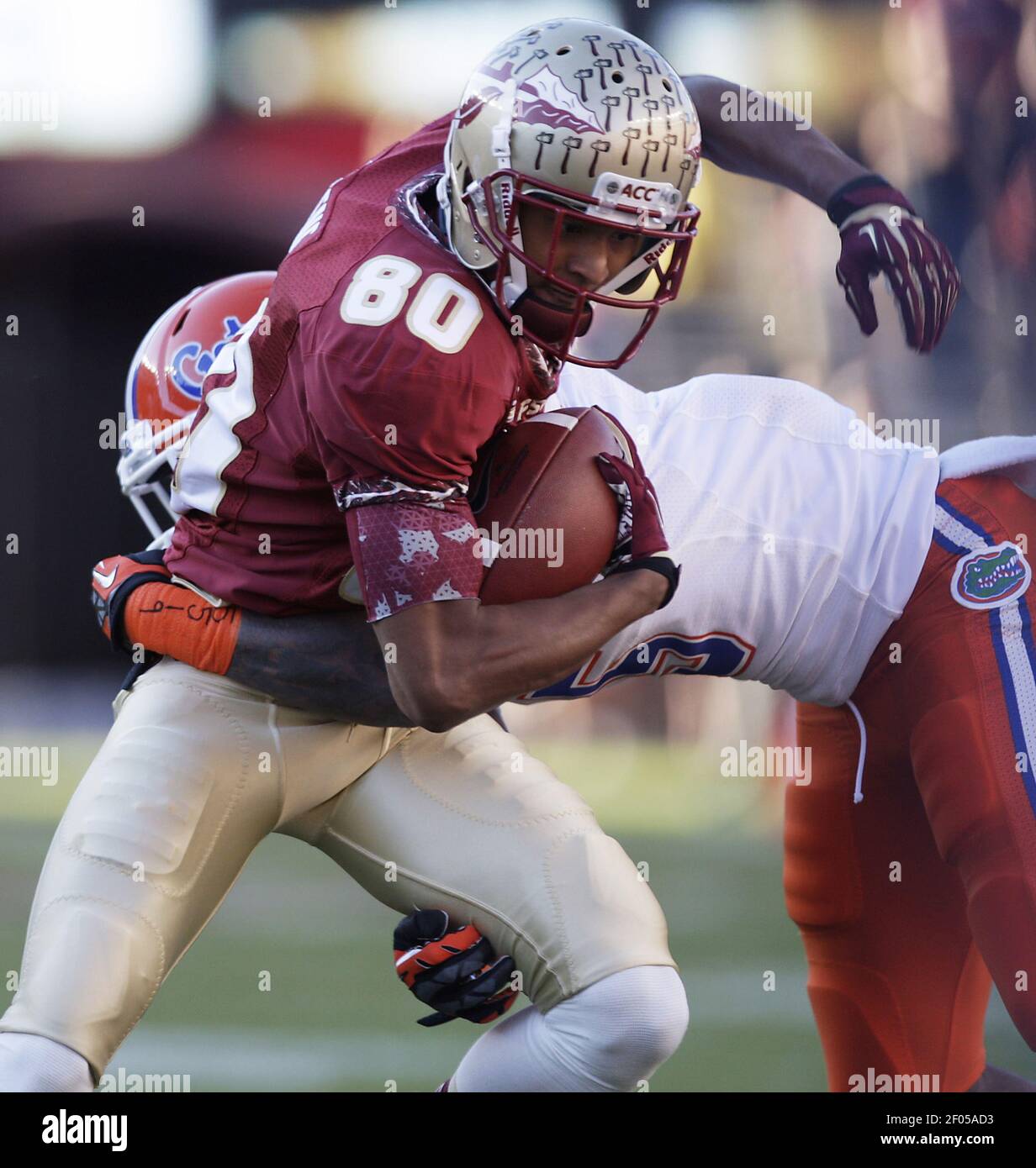 Florida State Seminoles wide receiver Rashad Greene (80) picks up a few  yards after a first-quarter catch against the Florida Gators at Doak  Campbell Stadium in Tallahassee, Florida on Saturday, November 24,