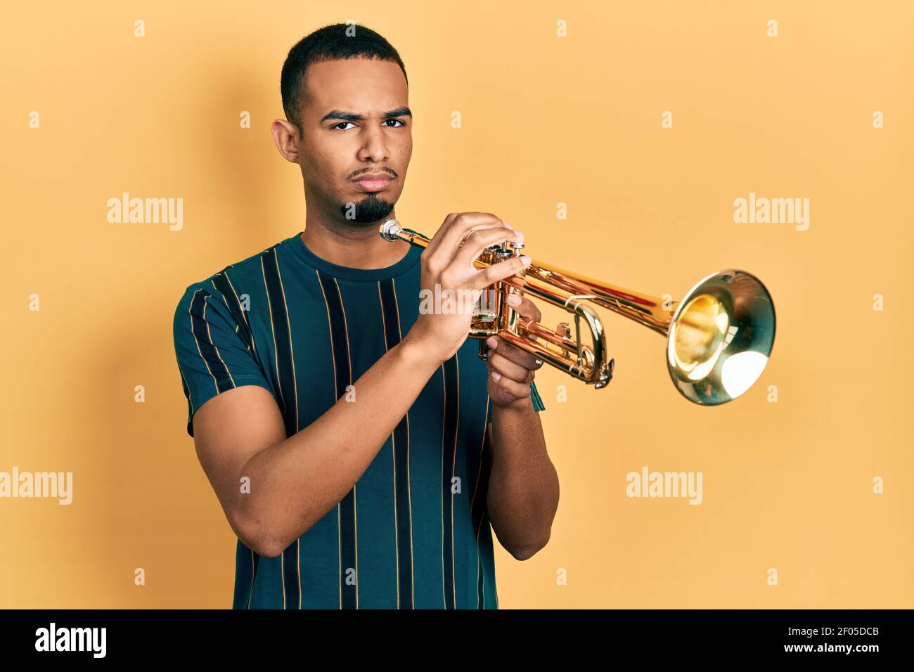 Guy playing trumpet hi-res stock photography and images - Page 3 - Alamy