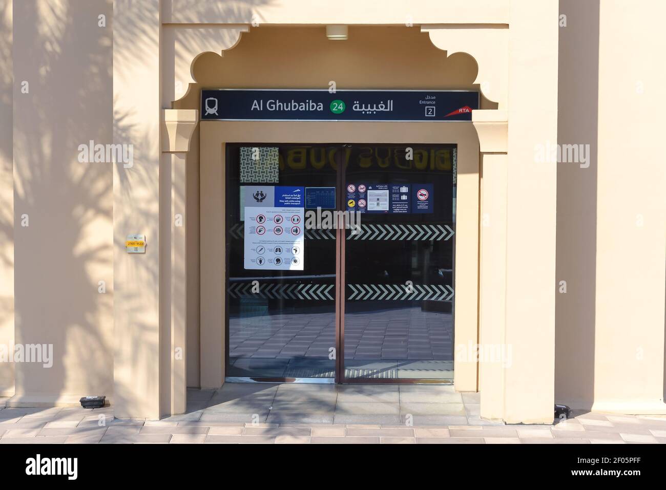 Al Ghubaiba Metro Station entrance in Dubai Creek. Public transport sign in Dubai in english and arabic. RTA Metro Station. Stock Photo