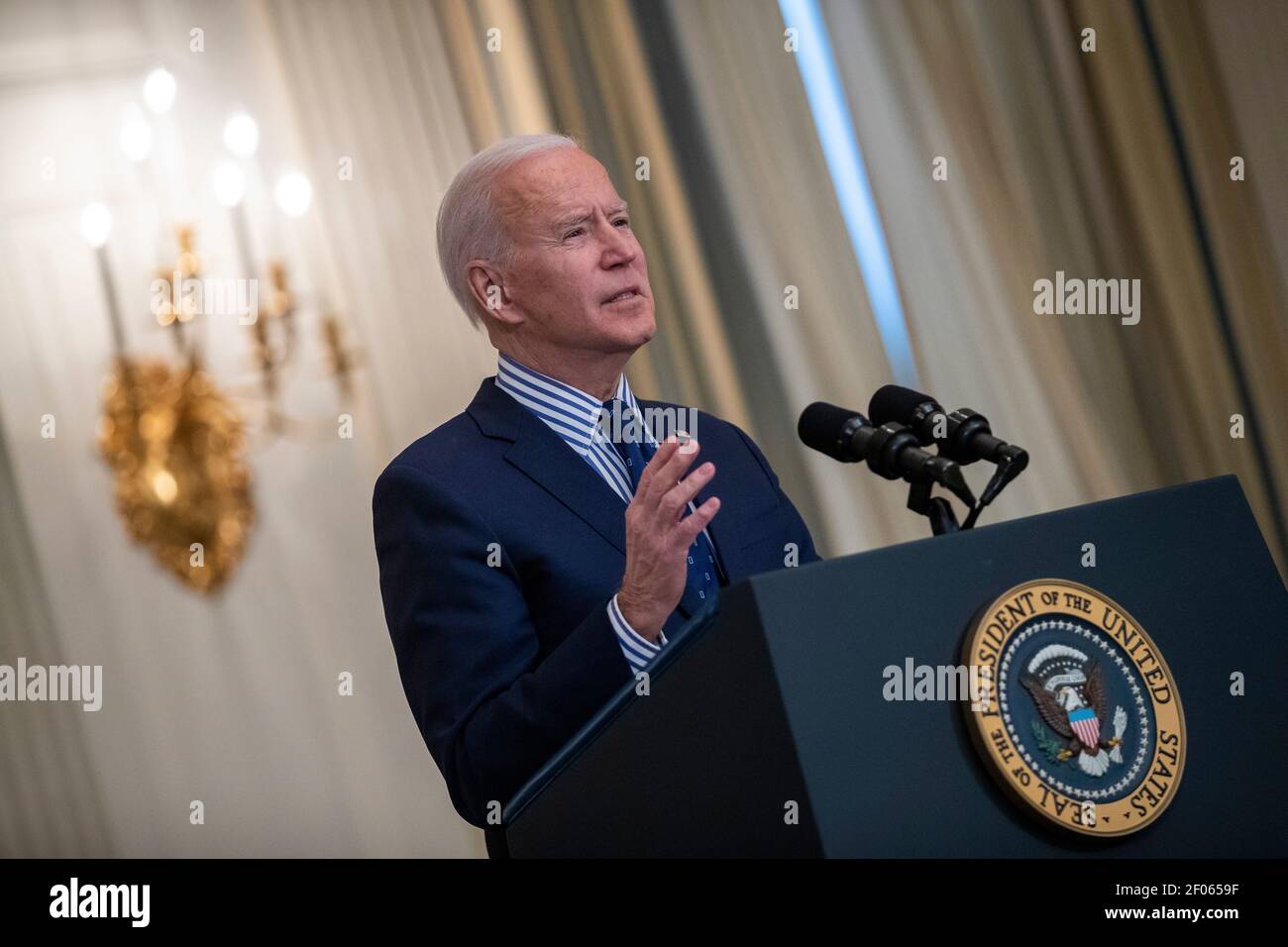 US President Joe Biden delivers remarks on the Senate Passage of the $1.9 trillion coronavirus relief bill from the State Dining Room of the White House in Washington, DC, USA, 06 March 2021. The bill now returns to the House for reconciliation where it is scheduled for a vote next Tuesday.Credit: Shawn Thew/Pool via CNP /MediaPunch Stock Photo
