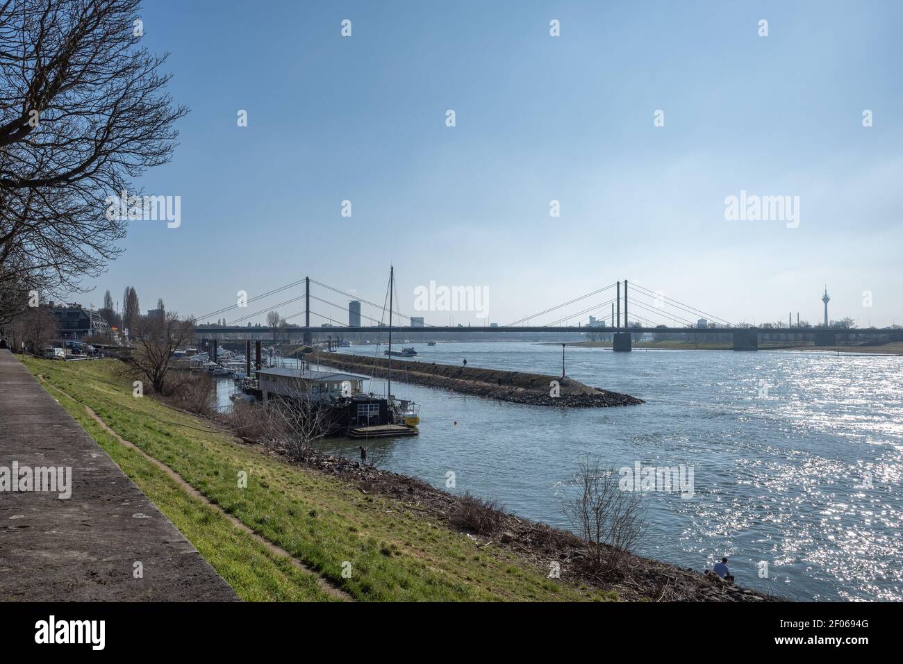 Rhine Riverside Outdoor sunny view along promenade riverside, pier and harbour on Rhine ...