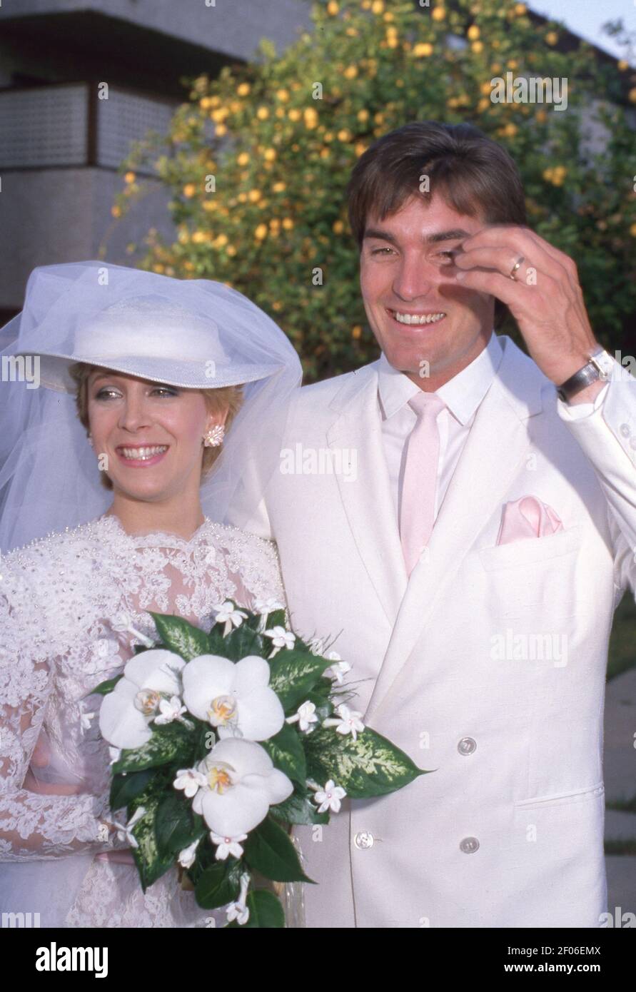 HOLLYWOOD - MAY 1: Actor Sam J. Jones and fiance Lynn Eriks pose for  photographs at their, image size:891x1390