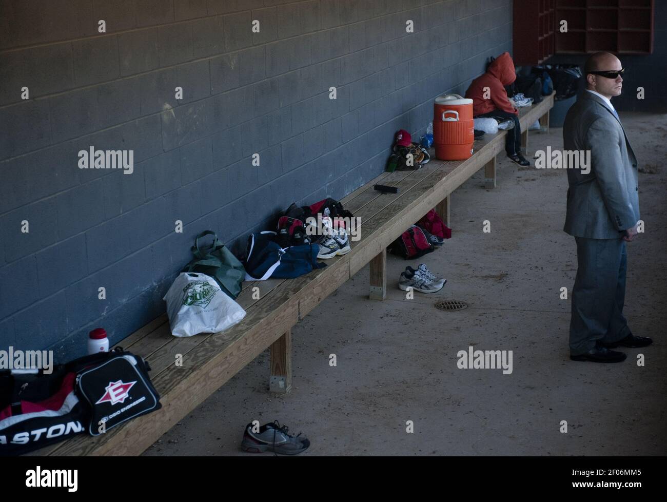 UNITED STATES Ð JUNE 14: File photo of a U.S. Capitol Police officer keeping an eye on the Republicans' baseball practice from the dugout at Four Mile Run Park in Alexandria, Va., on June 15, 2011. After the shooting at the GOP baseball practice on June 14, 2017, members of the GOP baseball team credited House Majority Whip Steve Scalise's U.S. Capitol Police security detail with preventing further injuries or deaths. (File Photo By Bill Clark/Roll Call) *** Please Use Credit from Credit Field *** Stock Photo