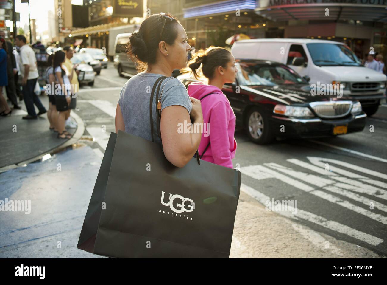 Shoppers in Times Square in New York are seen on Thursday, August 11, 2011.  Marcato Capital Management has exited their 8.5 percent stake in Deckers  Outdoor, the parent company of the Ugg