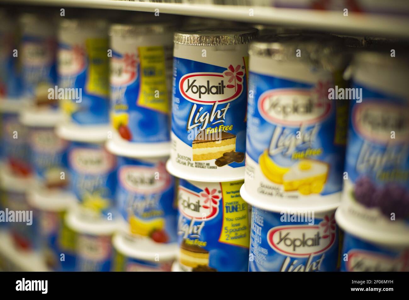 Containers of General Mills' Yoplait yogurt in a supermarket