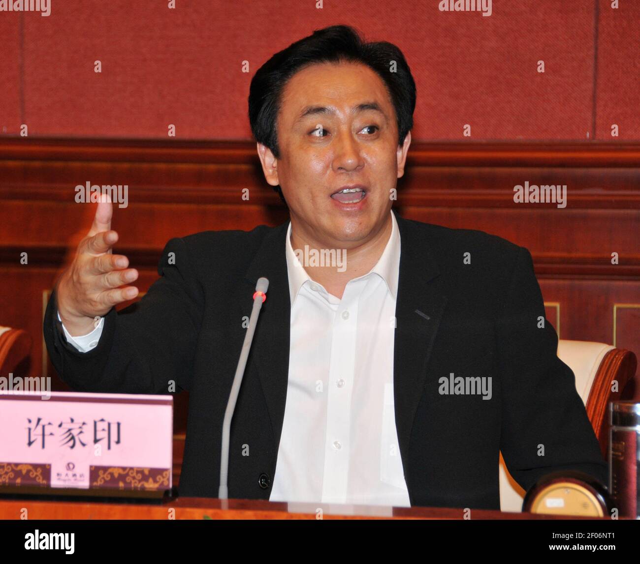 --FILE--Xu Jiayin (Hui Ka Yan), Chairman of Evergrande Group, delivers a speech at a conference of Henan Chamber of Commerce, Guangdong Province in Guangzhou city, south China's Guangdong province, 17 September 2011. Xu Jiayin (Hui Ka Yan), Chairman of Evergrande Group, ranks the third among the richest Chinese in 2019 according to Forbes. Stock Photo