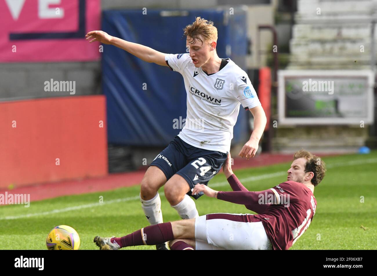 Tynecastle Park, Edinburgh, Scotland. UK 6TH March-21. Scottish  Championship Match .Hearts vs Dundee . Hearts Andy Halliday tackle on  Dundee midfielder, Max Anderson,(24) Credit: eric mccowat/Alamy Live News  Stock Photo - Alamy