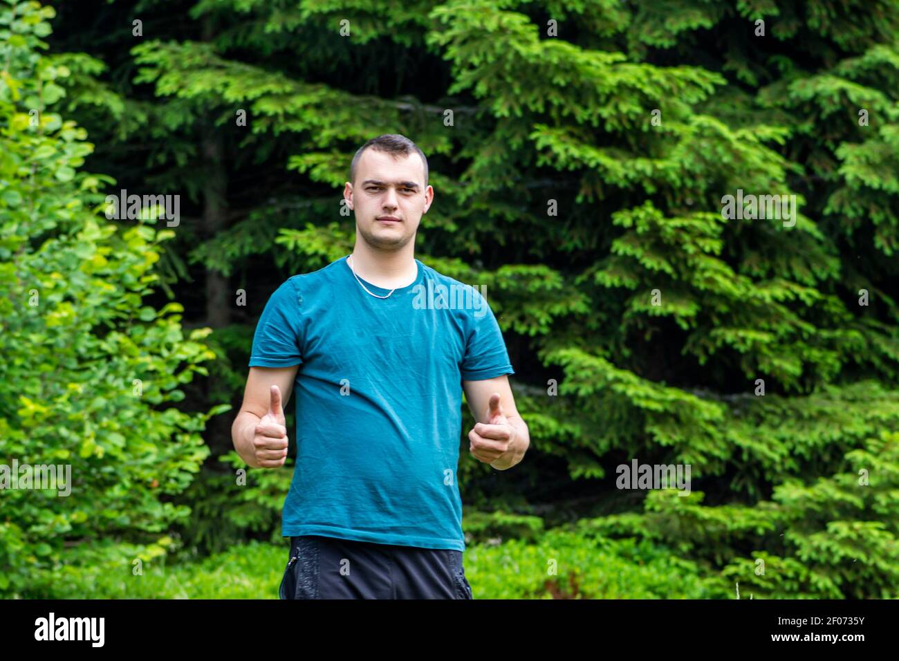 Man thumbs up wearing t shirt hi-res stock photography and images - Alamy
