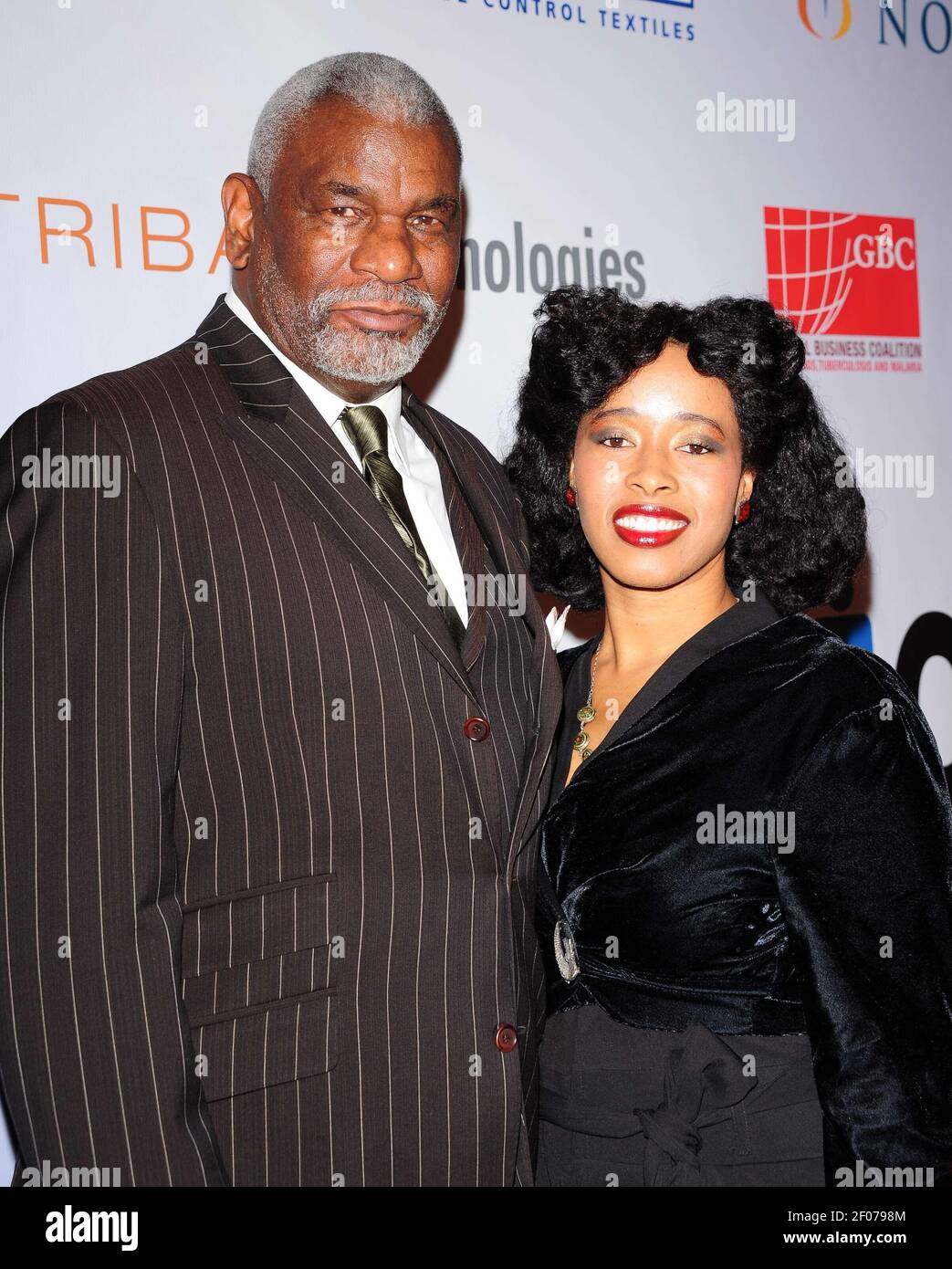 Richard Gant and Jasmine Patton. 1st Annual Global Action Awards Gala held  at The Beverly Hilton hotel. 18 February 2011, Beverly Hills, CA. Photo  Credit: Giulio Marcocchi/Sipa Press./GlobalAction gm.056/1102202308 Stock  Photo -