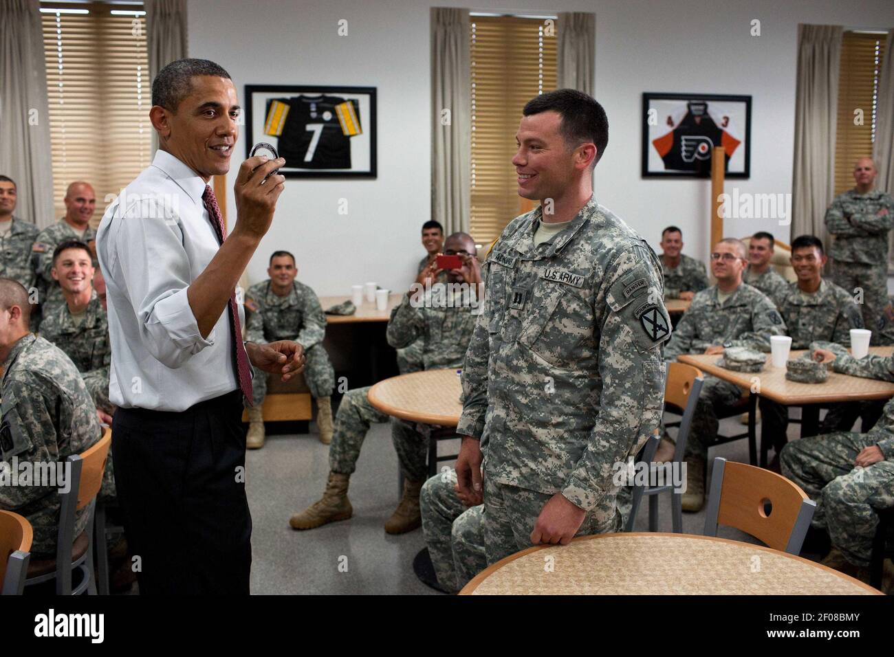 23 June 2011 - Fort Drum, NY - President Barack Obama speaks to soldiers of the 10th Mountain Division during a visit to Fort Drum in New York, June 23, 2011. Photo Credit: Pete Souza/White House/Sipa Press This official White House photograph is being made available only for publication by news organizations and/or for personal use printing by the subject(s) of the photograph. The photograph may not be manipulated in any way and may not be used in commercial or political materials, advertisements, emails, products, promotions that in any way suggests approval or endorsement of the President,  Stock Photo