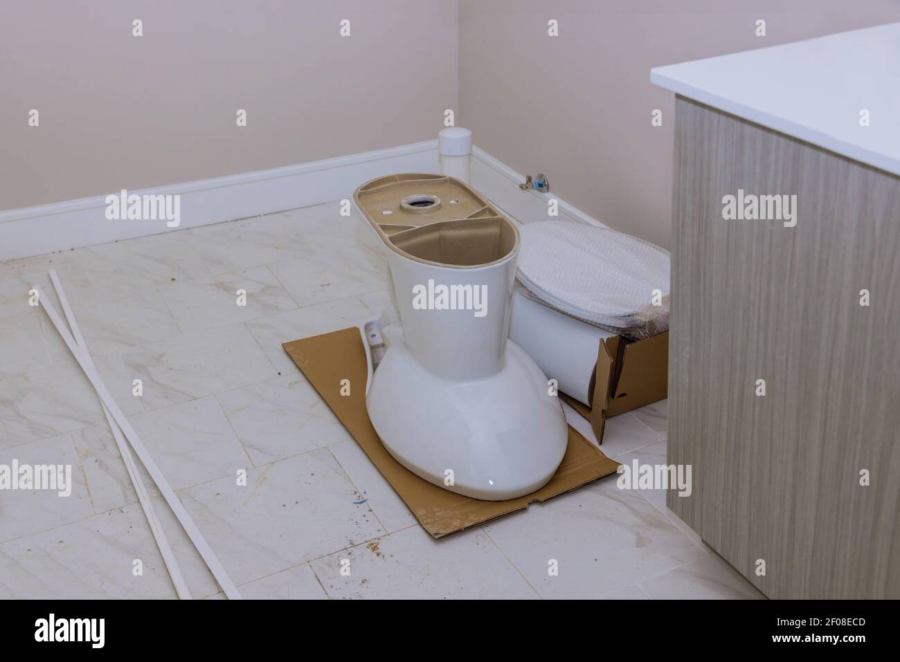 Preparation toilet tank in bathroom plumbing at home changes the toilet