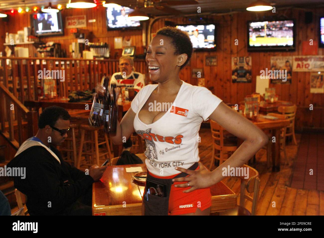 Hooters restaurant waitress-watch and download