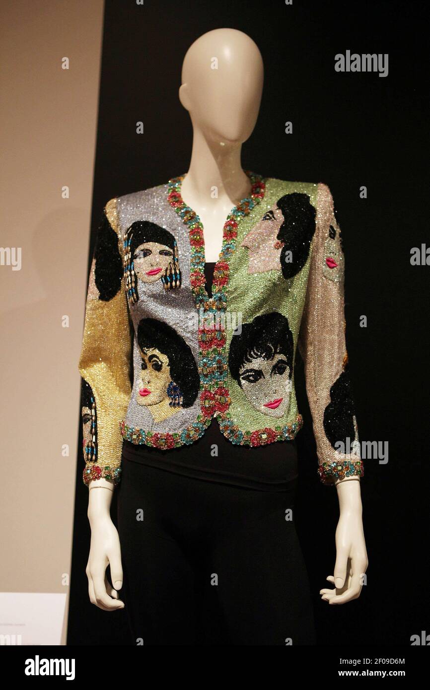 10 October 2011 - Los Angeles, CA - A Versace Beaded Evening Jacket The Face  is photographed during ChristieÃ•s LA Press Preview of The Collection of  Elizabeth Taylor in Los Angeles. Photo