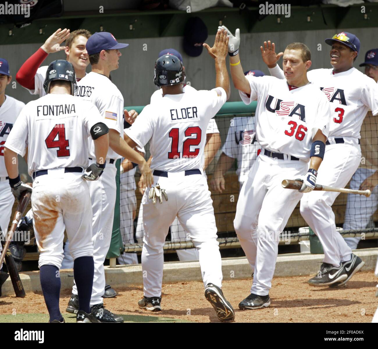 Usa S Chris Elder 12 Celebrates With Teammates After He Scored During The 7th Inning In Game One Of A Double Header Against Japan Usa Baseball S Collegiate National Team Beat Japan S College All Stars Usa S Chris Elder 12 Celebrates With Teammates After He Scored During The 7th Inning In Game One Of A Double Header Against Japan Usa Baseball S Collegiate National Team Beat Japan S College All Stars