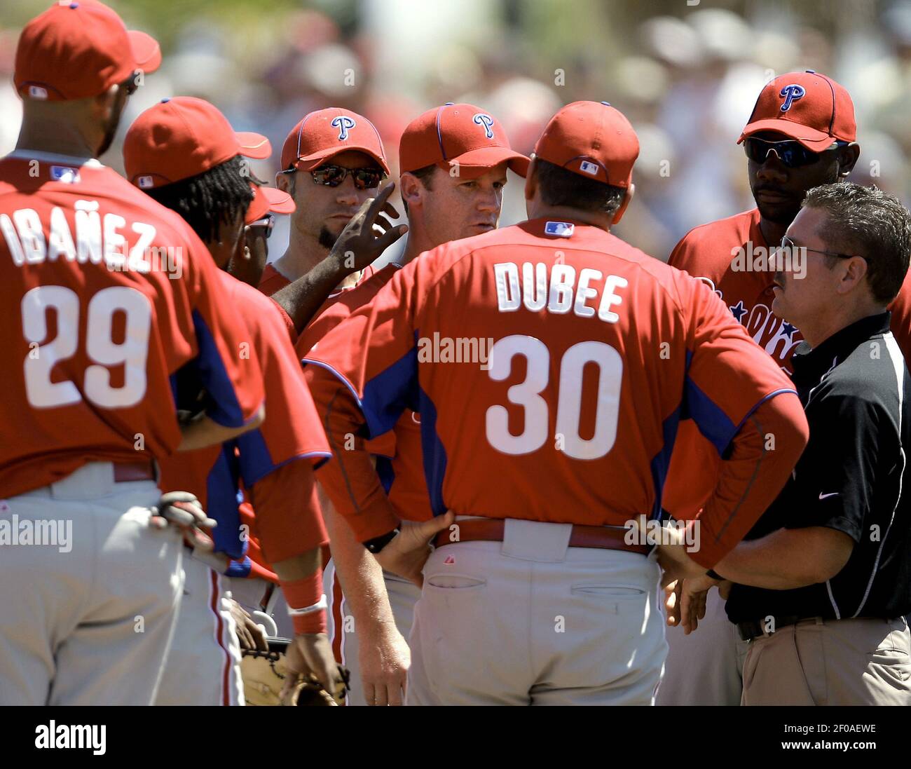 Philadelphia Phillies' Roy Oswalt, left, is greeted by teammate