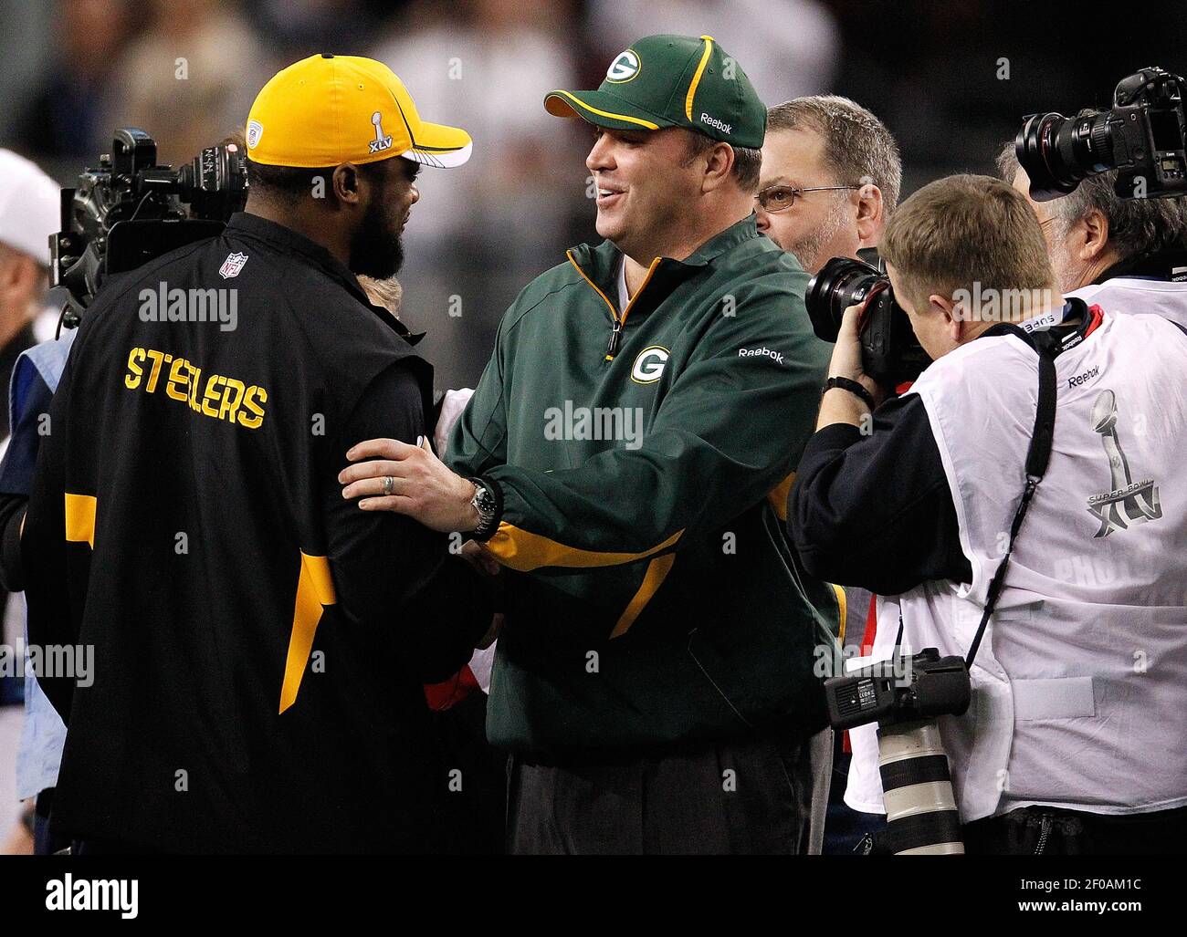 Pittsburgh Steeler head coach Mike Tomlin greets Green Bay Packers head