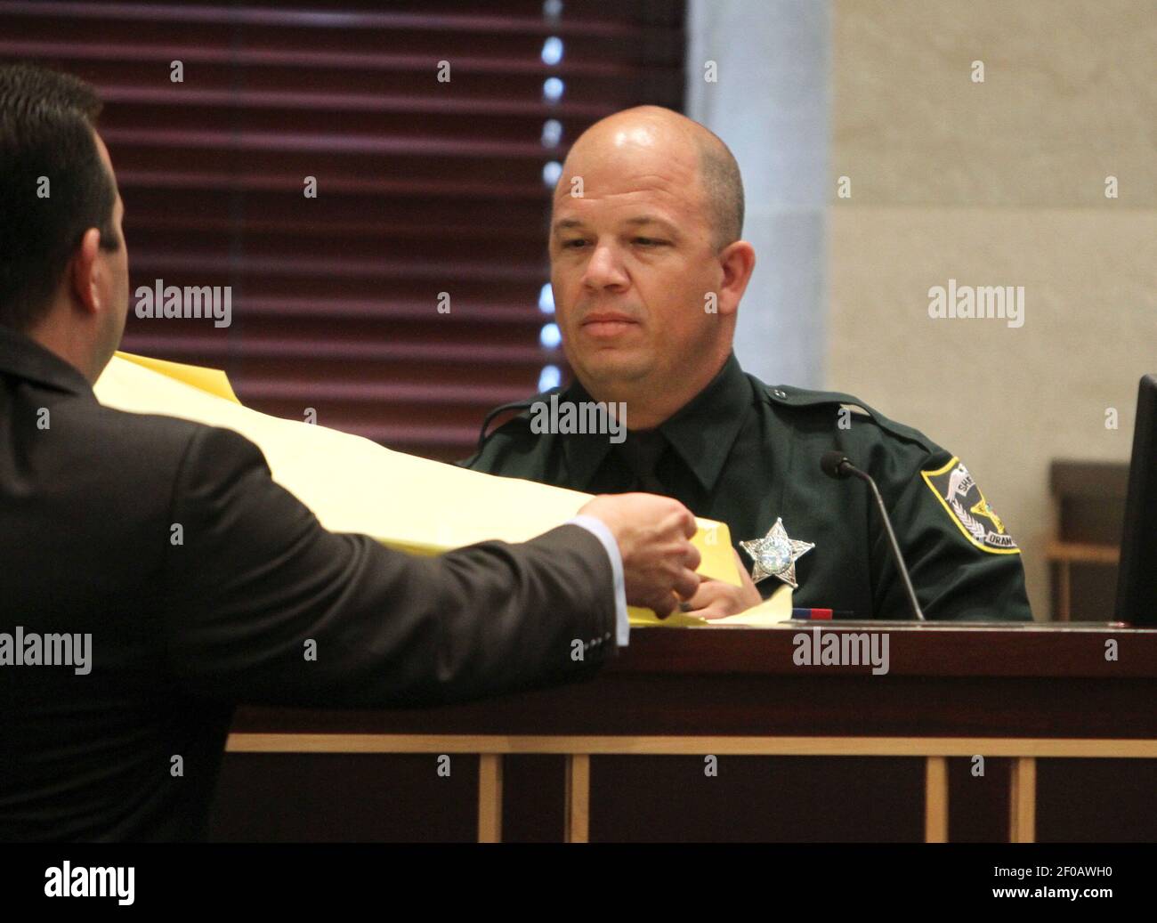 Jason a canine handler for the Orange County Sheriff's Department, testifies during the