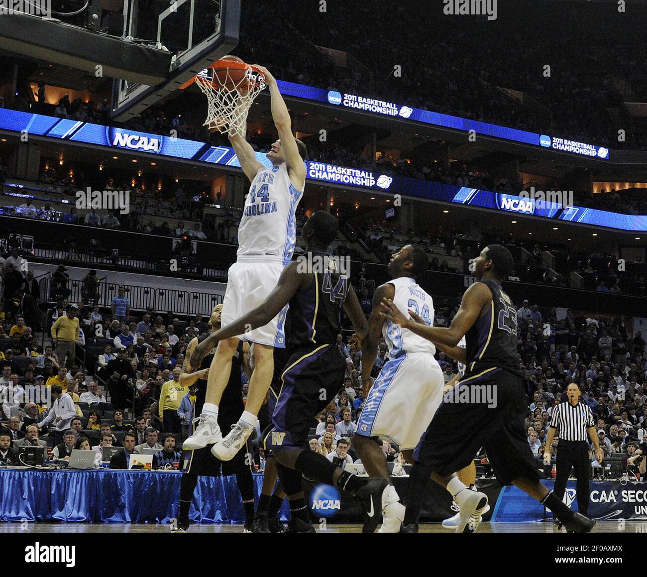 North Carolina's Tyler Zeller (44) gets a dunk against Washington during  the third round of the men's NCAA basketball tournament at Time Warner  Cable Arena in Charlotte, North Carolina, Sunday, March 20