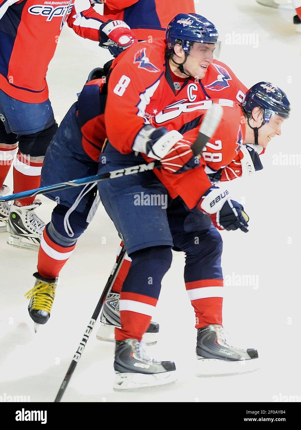 https://c8.alamy.com/comp/2F0AYB4/washington-capitals-left-wing-alex-ovechkin-8-jumps-on-the-back-of-left-wing-alexander-semin-28-after-semin-scored-the-game-winning-goal-during-the-overtime-period-of-game-1-of-the-nhl-eastern-conference-quarterfinals-playoffs-at-the-verizon-center-wednesday-april-13-2011-washington-defeated-new-york-2-1-in-overtime-photo-by-chuck-myersmctsipa-usa-2F0AYB4.jpg