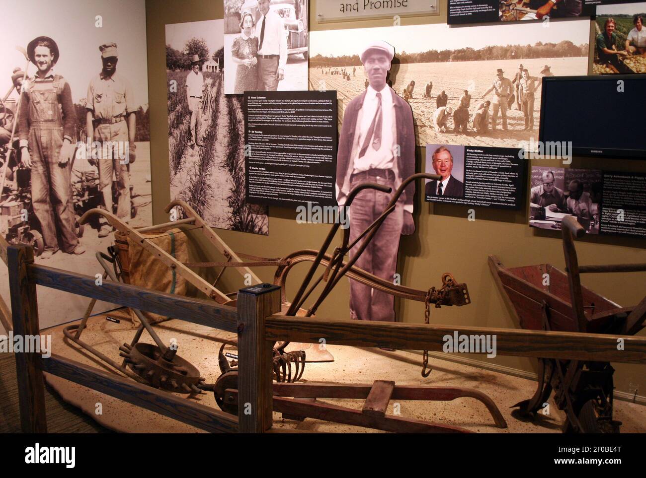 Antique farming equipment is part of the display at the newlyopened