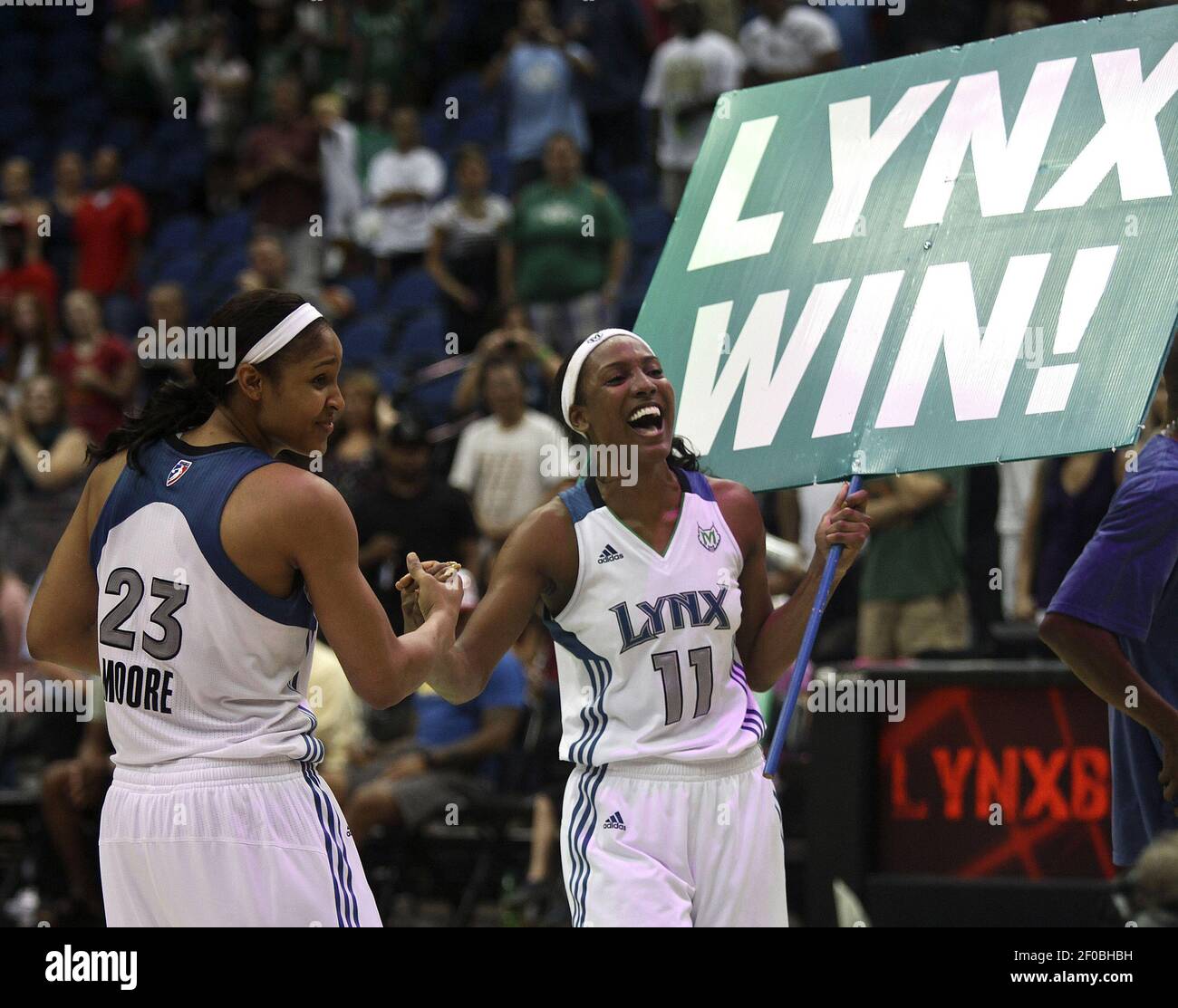 Minnesota Lynx teammates Maya Moore (23) and Candice Wiggins (11) celebrate a 92-76 win over the Seattle Storm at Target Center in Minneapolis, Minnesota, Friday, July 29, 2011. (Photo by Kyndell Harkness/Minneapolis Star Tribune/MCT/Sipa USA) Stock Photo