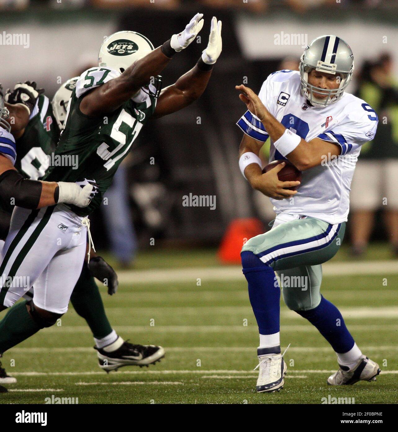 New York Jets Bart Scott sacks Dallas Cowboys quarterback Tony Romo ...