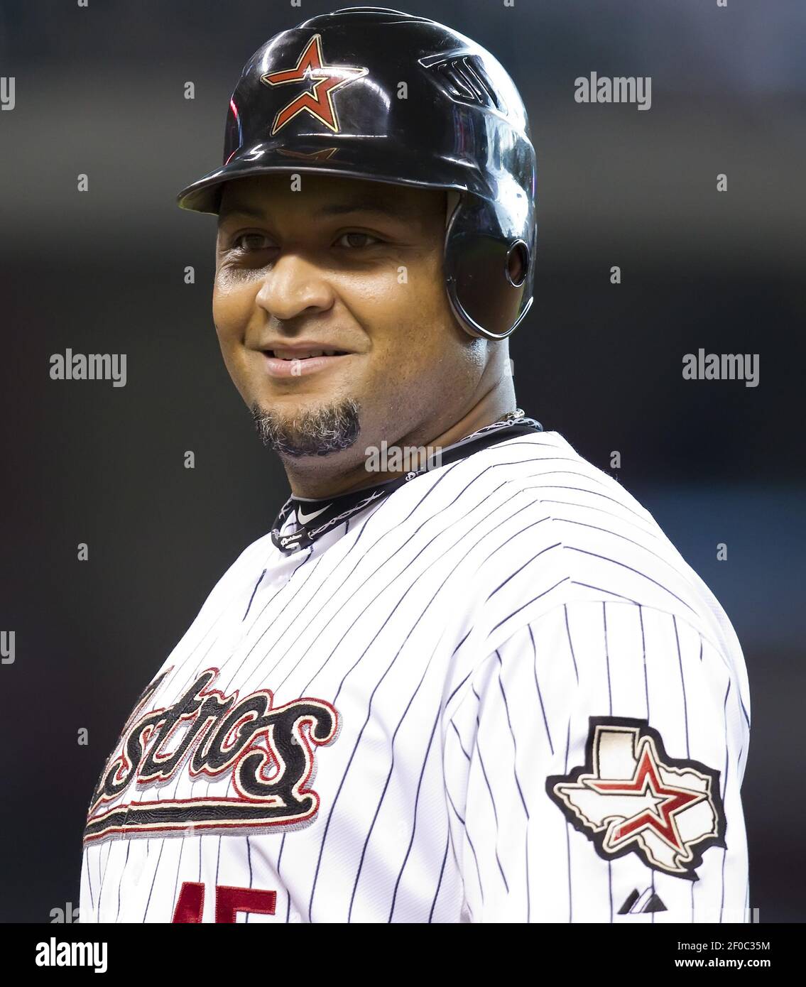 Houston Astros left fielder Carlos Lee (45) up to bat in the