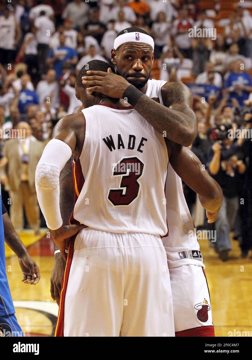 LeBron James, Dwyane Wade hug, swap jerseys in final meeting as Lakers win  vs. Heat