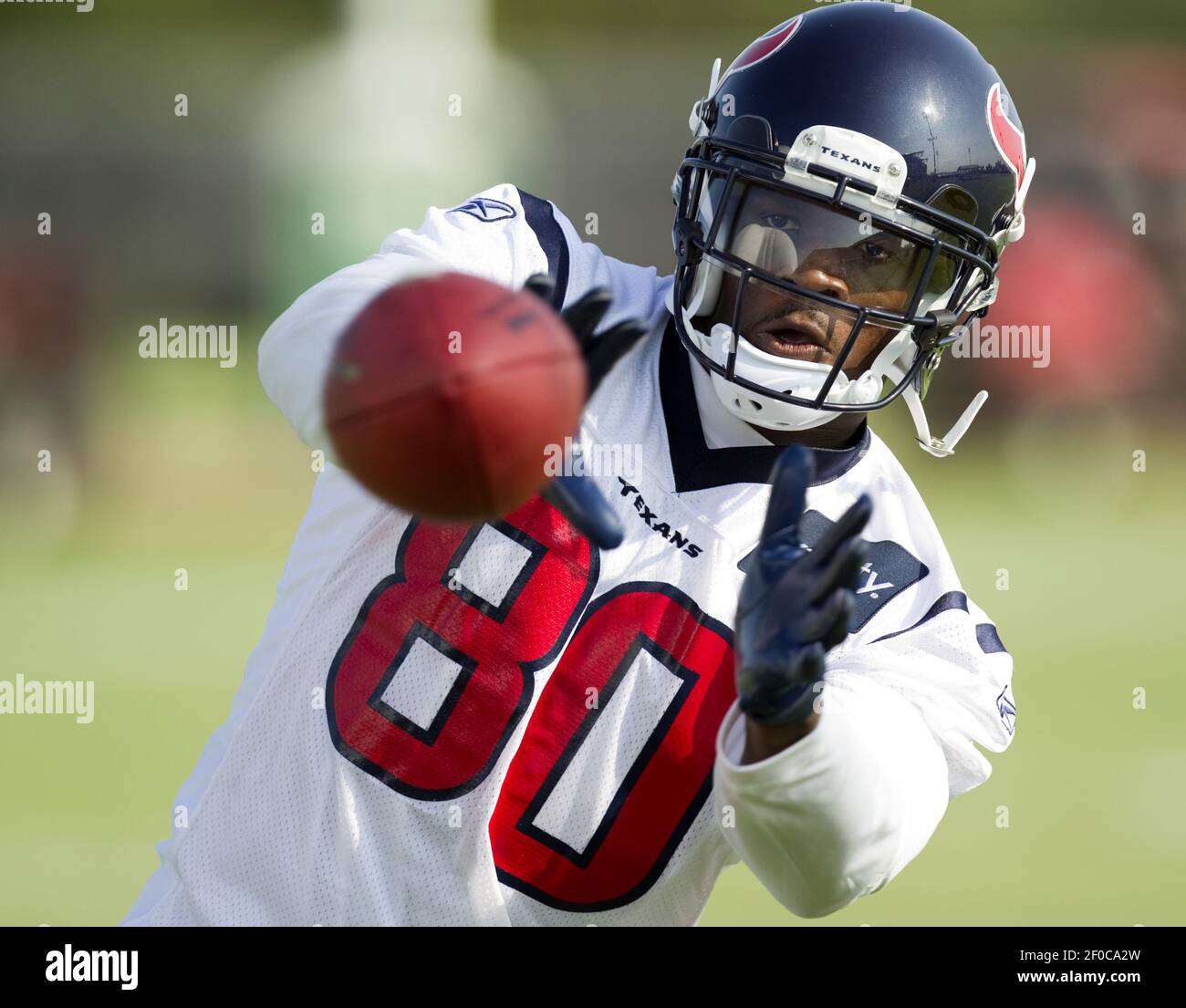 Houston Texans' Andre Johnson catches a pass on the first day of training  camp Saturday, July 28, 2012, in Houston. (AP Photo/Pat Sullivan Stock  Photo - Alamy