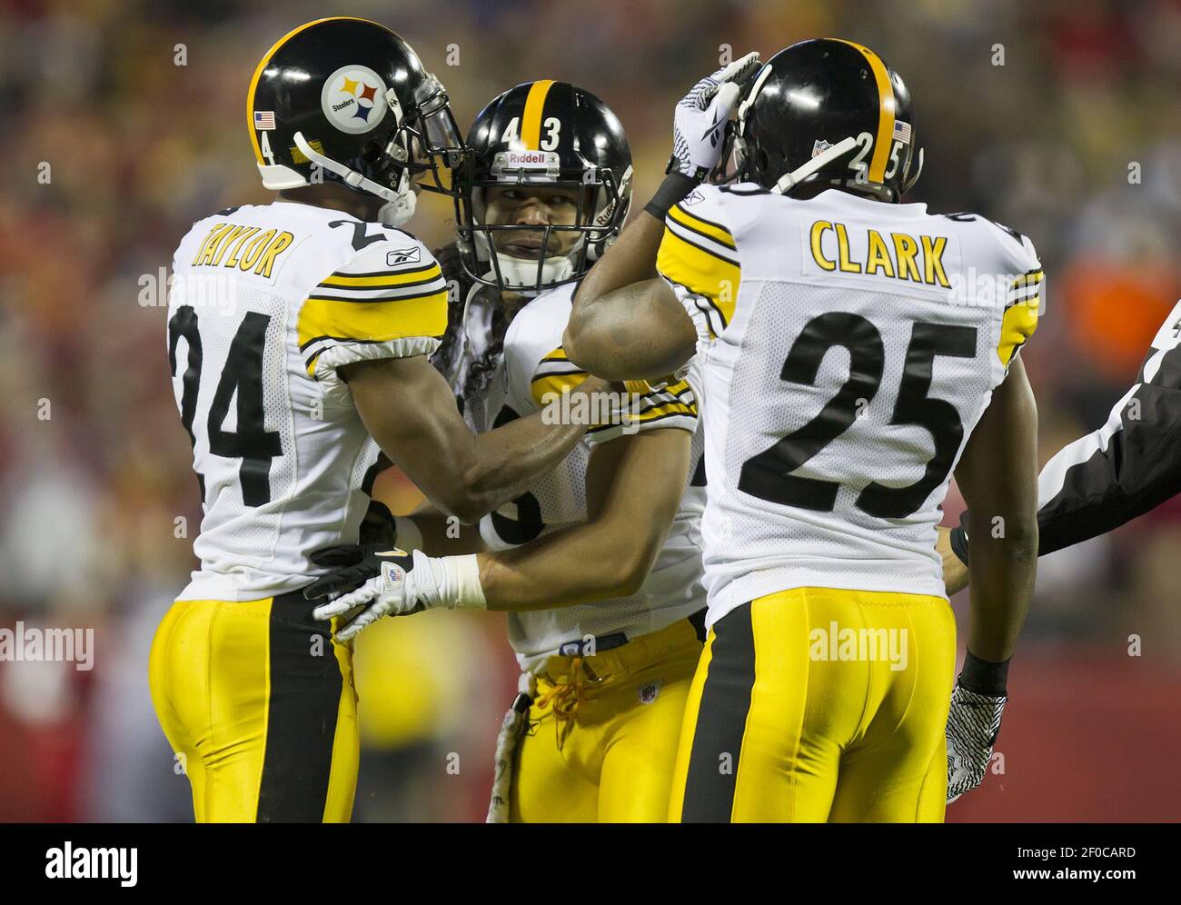 Pittsburgh Steelers Cornerback Ike Taylor 24 Left And Pittsburgh Steelers Free Safety Ryan Clark 25 Right Check On Pittsburgh Steelers Strong Safety Troy Polamalu 43 After He Was Dazed On A Tackle