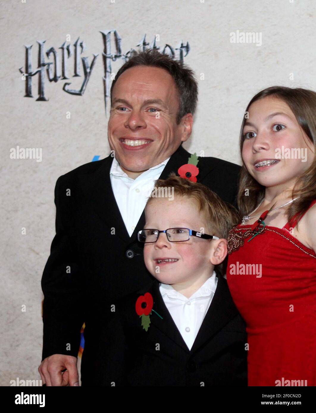Warwick Davis, with his family, as stars from the Harry Potter film