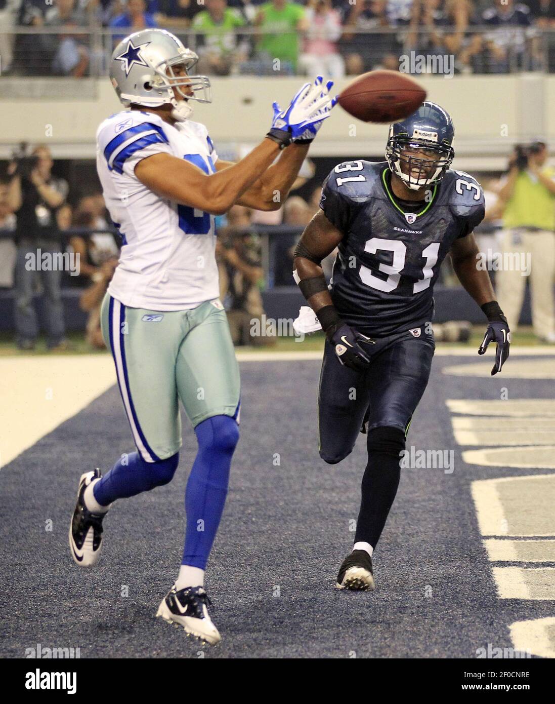 Dallas Cowboys wide receiver John Stephens Jr. (49) celebrates scoring a  touchdown during an NFL football