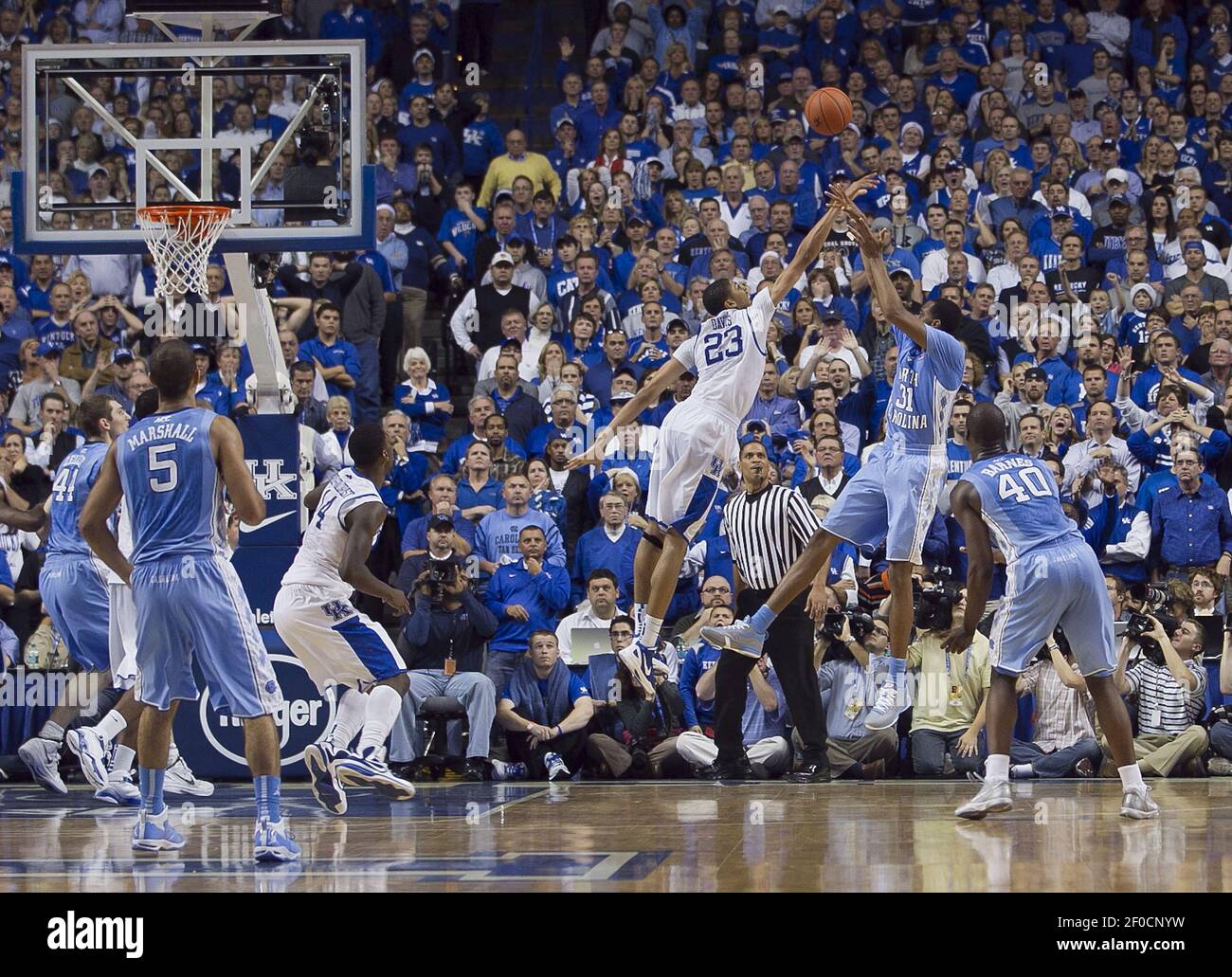 Kentucky's Anthony Davis (23) blocks a shot attempt by North Carolina's  John Henson (31) during their men's college basketball game. The University  of Kentucky Wildcats defeated the University of North Carolina Tar