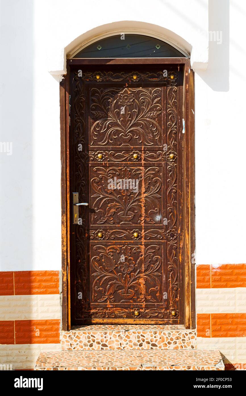 Oman old wooden door wall hi-res stock photography and images - Alamy