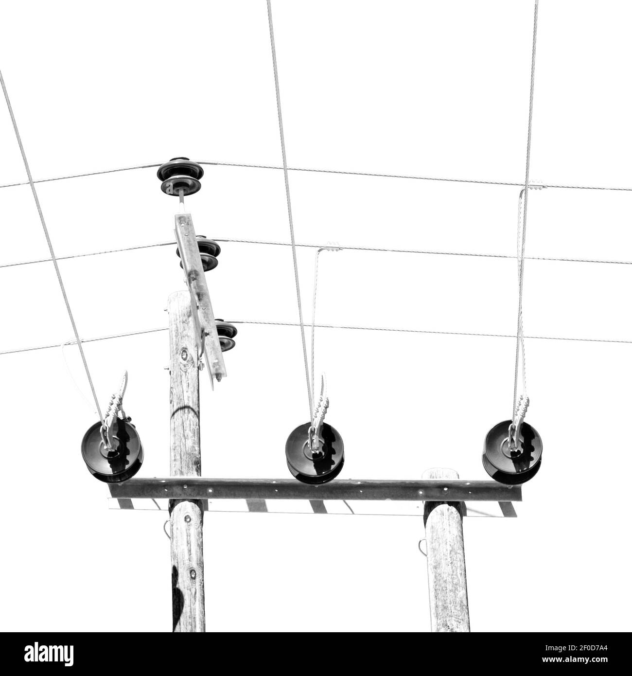 In oman the electric cable wood pylon energy and current line Stock