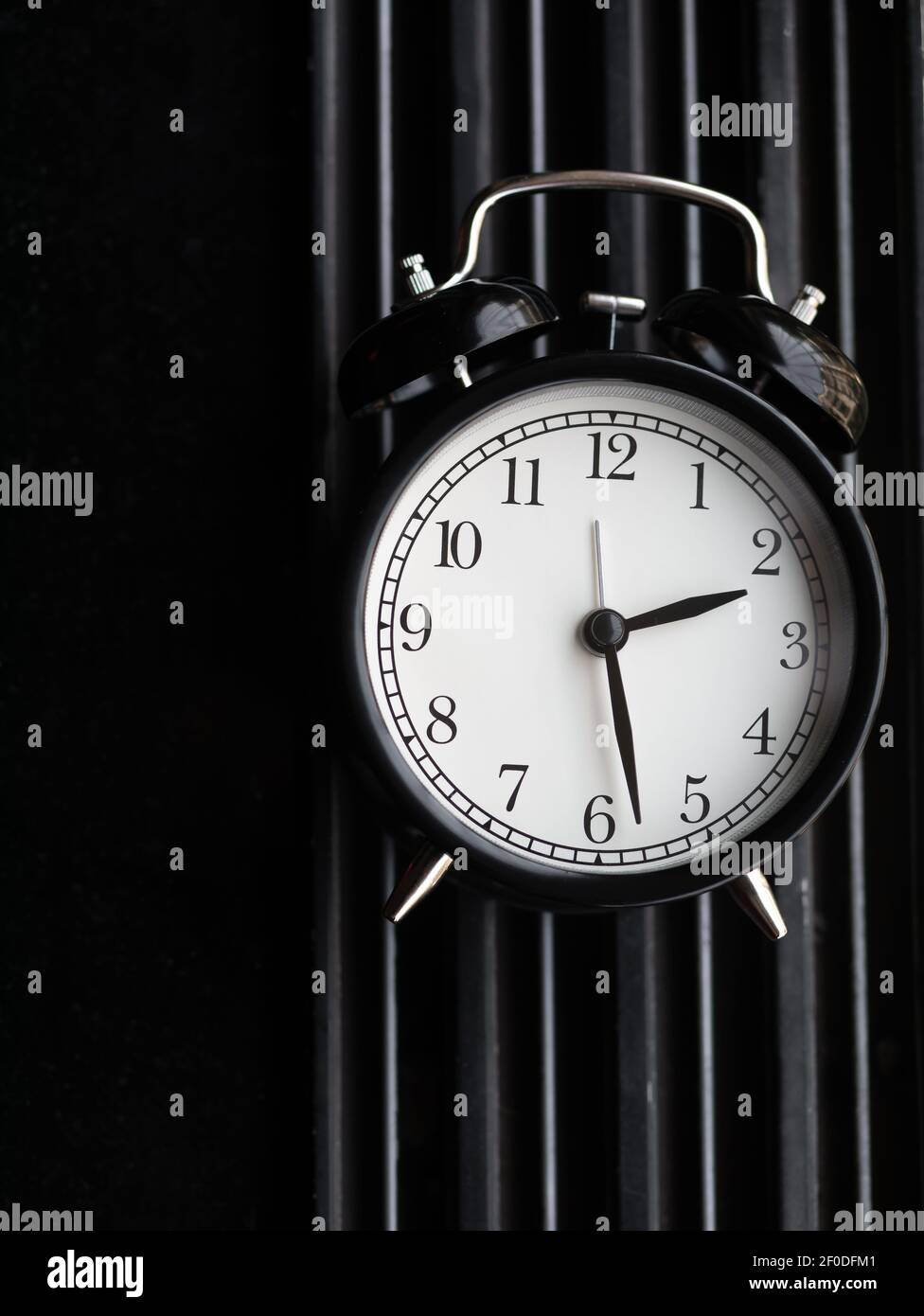 black vintage or retro alarm clock Stock Photo